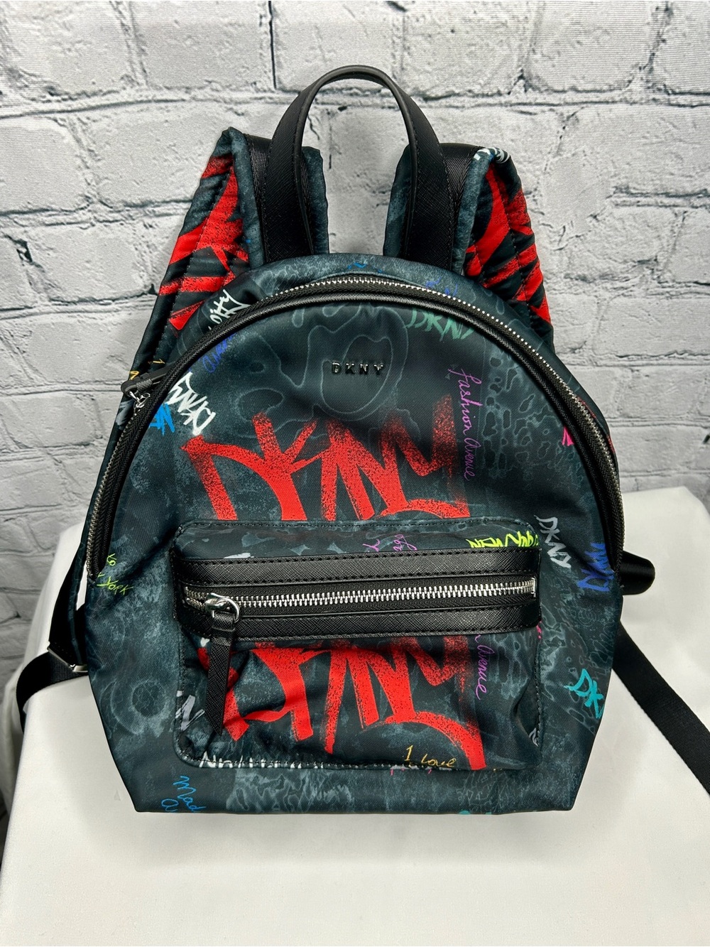 DKNY Black Mini Backpack with Red Graffiti Accents